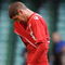 CARDIFF, UNITED KINGDOM - MARCH 28:  Carl Robinson of Wales leaves the field looking dejected during the FIFA 2010 World Cup Qualifier Group 4 match between Wales and Finland at the Millennium Stadium on March 28, 2009 in Cardiff, Wales.  (Photo by Christopher Lee/Getty Images)