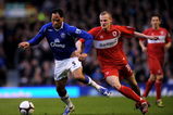 LIVERPOOL, UNITED KINGDOM - MARCH 08:  Joleon Lescott of Everton is challenged by David Wheater of Middlesbrough during the FA Cup Sponsored by E.on 5th Round  match between Everton and Middlesbrough at Goodison Park on March 8, 2009 in Liverpool, England.  (Photo by Shaun Botterill/Getty Images)