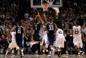BOSTON - MARCH 28:  Scottie Reynolds #1 of the Villanova Wildcats puts up the game-winning shot against the Pittsburgh Panthersduring the NCAA Men's Basketball Tournament East Regionals at TD Banknorth Garden on March 28, 2009 in Boston, Massachusetts.  (Photo by Elsa/Getty Images)