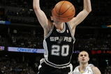 DENVER - APRIL 28:  Manu Ginobili #20 of the San Antonio Spurs loses the ball on his way to the basket against Linas Kleiza #43 of the Denver Nuggets in the first half of Game Three of the Western Conference Quarterfinals during the 2007 NBA Playoffs at the Pepsi Center on April 28, 2007 in Denver, Colorado.  NOTE TO USER: User expressly acknowledges and agrees that, by downloading and or using this photograph, User is consenting to the terms and conditions of the Getty Images License Agreement.  (Photo by Brian Bahr/Getty Images)