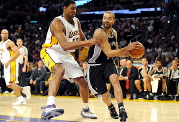 LOS ANGELES, CA - JANUARY 25:  Tony Parker #9 of the San Antonio Spurs drives the ball against Andrew Bynum #17 of the Los Angeles Lakers during the first quarter at the Staples Center on January 25, 2009 in Los Angeles, California. NOTE TO USER:  User expressly acknowledges and agrees that, by downloading and/or using this photograph, User is consenting to the terms and conditions of the Getty Images License Agreement.  (Photo by Harry How/Getty Images)