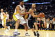 LOS ANGELES, CA - JANUARY 25:  Tony Parker #9 of the San Antonio Spurs drives the ball against Andrew Bynum #17 of the Los Angeles Lakers during the first quarter at the Staples Center on January 25, 2009 in Los Angeles, California. NOTE TO USER:  User expressly acknowledges and agrees that, by downloading and/or using this photograph, User is consenting to the terms and conditions of the Getty Images License Agreement.  (Photo by Harry How/Getty Images)