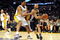 LOS ANGELES, CA - JANUARY 25:  Tony Parker #9 of the San Antonio Spurs drives the ball against Andrew Bynum #17 of the Los Angeles Lakers during the first quarter at the Staples Center on January 25, 2009 in Los Angeles, California. NOTE TO USER:  User expressly acknowledges and agrees that, by downloading and/or using this photograph, User is consenting to the terms and conditions of the Getty Images License Agreement.  (Photo by Harry How/Getty Images)