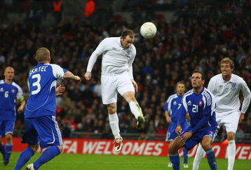 LONDON - MARCH 28:  Wayne Rooney of England heads England's second goal during the International Friendly match between England and Slovakia at Wembley Stadium on March 28, 2009 in London, England.  (Photo by Jamie McDonald/Getty Images)