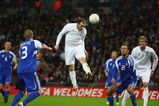 LONDON - MARCH 28:  Wayne Rooney of England heads England's second goal during the International Friendly match between England and Slovakia at Wembley Stadium on March 28, 2009 in London, England.  (Photo by Jamie McDonald/Getty Images)