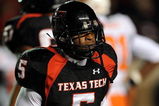 LUBBOCK, TX - NOVEMBER 08:  Wide receiver Michael Crabtree #5 of the Texas Tech Red Raiders during play against the Oklahoma State Cowboys at Jones AT&T Stadium on November 8, 2008 in Lubbock, Texas.  (Photo by Ronald Martinez/Getty Images)