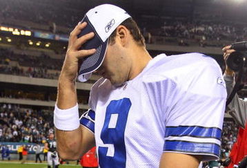 PHILADELPHIA - DECEMBER 28:  Tony Romo #9 of the Dallas Cowboys walks off the field after playing the Philadelphia Eagles on December 28, 2008 at Lincoln Financial Field in Philadelphia, Pennsylvania. The Eagles defeated the Cowboys 44-6.  (Photo by Jim McIsaac/Getty Images)