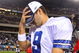 PHILADELPHIA - DECEMBER 28:  Tony Romo #9 of the Dallas Cowboys walks off the field after playing the Philadelphia Eagles on December 28, 2008 at Lincoln Financial Field in Philadelphia, Pennsylvania. The Eagles defeated the Cowboys 44-6.  (Photo by Jim McIsaac/Getty Images)