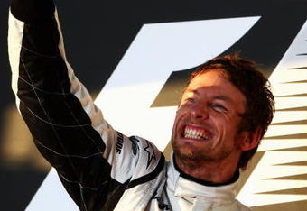 MELBOURNE, AUSTRALIA - MARCH 29:  Jenson Button of Great Britain and Brawn GP celebrates on the podium after winning the Australian Formula One Grand Prix at the Albert Park Circuit on March 29, 2009 in Melbourne, Australia.  (Photo by Clive Mason/Getty Images)