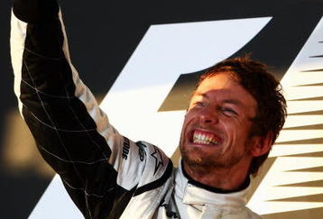 MELBOURNE, AUSTRALIA - MARCH 29:  Jenson Button of Great Britain and Brawn GP celebrates on the podium after winning the Australian Formula One Grand Prix at the Albert Park Circuit on March 29, 2009 in Melbourne, Australia.  (Photo by Clive Mason/Getty Images)