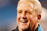 CHARLOTTE, NC - JANUARY 10:  John Fox Head Coach of the Carolina Panthers smiles during warm-ups before the game against the Arizona Cardinals during the NFC Divisional Playoff Game on January 10, 2009 at Bank of America Stadium in Charlotte, North Carolina.  (Photo by Streeter Lecka/Getty Images)
