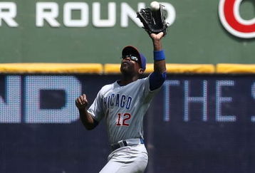 MILWAUKEE - JULY 31:  Alfonso Soriano #12 of the Chicago Cubs leaps as he makes a catch of a fly ball hit by Prince Fielder of the Milwaukee Brewers at Miller Park on July 31, 2008 in Milwaukee, Wisconsin. The Cubs defeated the Brewers 11-4.  (Photo by Jonathan Daniel/Getty Images)