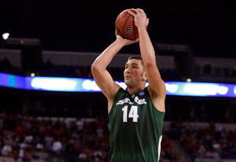 INDIANAPOLIS - MARCH 29:  Goran Suton #14 of the Michigan State Spartans attempts a shot against the Louisville Cardinals  during the fourth round of the NCAA Division I Men's Basketball Tournament at the Lucas Oil Stadium on March 29, 2009 in Indianapolis, Indiana.  (Photo by Andy Lyons/Getty Images)