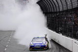 MARTINSVILLE, VA - MARCH 29:  Jimmie Johnson, driver of the #48 Lowe's Chevrolet, does a burnout after winning the NASCAR Sprint Cup Series Goody's Fast Pain Relief 500 at the Martinsville Speedway on March 29, 2009 in Martinsville, Virginia.  (Photo by Rusty Jarrett/Getty Images for NASCAR)