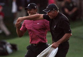 ORLANDO, FL - MARCH 29:  Tiger Woods of the USA holes for a winning birdie at the 18th hole during the final round of the Arnold Palmer Invitational Presented by Mastercard at the Bay Hill Club and Lodge on March 29, 2009 in Orlando, Florida  (Photo by David Cannon/Getty Images)