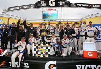 MARTINSVILLE, VA - MARCH 29:  Jimmie Johnson, driver of the #48 Lowe's Chevrolet, celebrates in victory lane after winning the NASCAR Sprint Cup Series Goody's Fast Pain Relief 500 at the Martinsville Speedway on March 29, 2009 in Martinsville, Virginia.  (Photo by Jerry Markland/Getty Images for NASCAR)