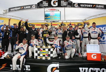 MARTINSVILLE, VA - MARCH 29:  Jimmie Johnson, driver of the #48 Lowe's Chevrolet, celebrates in victory lane after winning the NASCAR Sprint Cup Series Goody's Fast Pain Relief 500 at the Martinsville Speedway on March 29, 2009 in Martinsville, Virginia.  (Photo by Jerry Markland/Getty Images for NASCAR)
