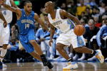 DENVER - JANUARY 17:  Chauncey Billups #7 of the Denver Nuggets drives against Jameer Nelson #14 of the Orlando Magic during NBA action at the Pepsi Center on January 17, 2009 in Denver, Colorado. NOTE TO USER: User expressly acknowledges and agrees that, by downloading and or using this Photograph, user is consenting to the terms and conditions of the Getty Images License Agreement.  (Photo by Doug Pensinger/Getty Images)