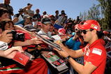 MELBOURNE, AUSTRALIA - MARCH 29:  Felipe Massa of Brazil and Ferrari signs autographs for race fans prior to the Australian Formula One Grand Prix at the Albert Park Circuit on March 29, 2009 in Melbourne, Australia.  (Photo by Robert Cianflone/Getty Images)