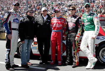 MARTINSVILLE, VA - MARCH 29: (L-R) The Hendrick Motorsports team including Jimmie Johnson, driver of the #48 Lowe's Chevrolet, Geoffrey Bodine, Team Owner Rick Hendrick, Mark Martin, driver of the #5 CARQUEST/Kellogg's Chevrolet, Jeff Gordon, driver of the #24 DuPont Chevrolet, and Dale Earnhardt Jr., driver of the #88 National Guard/AMP Energy Chevrolet, stand on the grid prior to the start of the NASCAR Sprint Cup Series Goody's Fast Pain Relief 500 at the Martinsville Speedway on March 29, 2009 in Martinsville, Virginia.  (Photo by Jerry Markland/Getty Images for NASCAR)