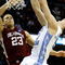 MEMPHIS, TN - MARCH 29:  Tyler Hansbrough #50 of the North Carolina Tar Heels goes up for a dunk over Blake Griffin #23 of the Oklahoma Sooners in the second half during the NCAA Men's Basketball Tournament South Regional Final at the FedExForum on March 29, 2009 in Memphis, Tennessee. The Tar Heels defeated the Sooners 72-60 to advance to the Final Four. (Photo by Joe Murphy/Getty Images)