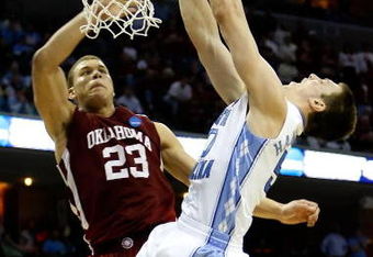 MEMPHIS, TN - MARCH 29:  Tyler Hansbrough #50 of the North Carolina Tar Heels goes up for a dunk over Blake Griffin #23 of the Oklahoma Sooners in the second half during the NCAA Men's Basketball Tournament South Regional Final at the FedExForum on March 29, 2009 in Memphis, Tennessee. The Tar Heels defeated the Sooners 72-60 to advance to the Final Four. (Photo by Joe Murphy/Getty Images)