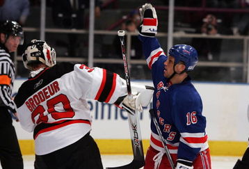 NEW YORK - APRIL 13: Sean Avery #16 of the New York Rangers tries to screen Martin Brodeur #30 of the New Jersey Devils during game three of the 2008 NHL Eastern Conference Quarterfinals on April 13, 2008 at Madison Square Garden in New York City.  (Photo by Jim McIsaac/Getty Images)