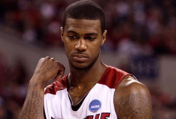 INDIANAPOLIS - MARCH 29:  Earl Clark #5 of the Louisville Cardinals looks on against the Michigan State Spartans during the fourth round of the NCAA Division I Men's Basketball Tournament at the Lucas Oil Stadium on March 29, 2009 in Indianapolis, Indiana.  (Photo by Andy Lyons/Getty Images)