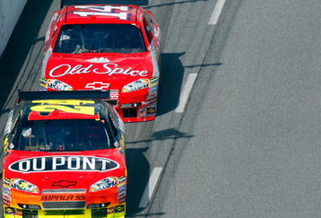 MARTINSVILLE, VA - MARCH 29: Jeff Gordon, driver of the #24 DuPont Chevrolet, leads Tony Stewart, driver of the #14 Office Depot Chevrolet, during the NASCAR Sprint Cup Series Goody's Fast Pain Relief 500 at the Martinsville Speedway on March 29, 2009 in Martinsville, Virginia.  (Photo by John Harrelson/Getty Images)