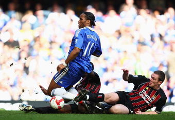 LONDON - MARCH 15:  Didier Drogba of Chelsea is challenged by Richard Dunne of Manchester City during the Barclays Premier League match between Chelsea and Manchester City at Stamford Bridge on March 15, 2009 in London, England.  (Photo by Clive Mason/Getty Images)