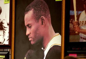 PITTSBURGH - JULY 7: Fans look over Roberto Clemente memorabilia during opening day of Fan Fest for the Major League Baseball 2006 All-Star game at the David L. Lawrence Convention Center July 7, 2006 in Pittsburgh, Pennsylvania. (Photo by Paul Hawthorne/Getty Images)