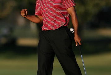 ORLANDO, FL - MARCH 29:  Tiger Woods celebrates a birdie putt on the 15th hole during the final round of the Arnold Palmer Invitational Presented by Mastercard at the Bay Hill Club and Lodge on March 29, 2009 in Orlando, Florida   (Photo by Doug Benc/Getty Images)