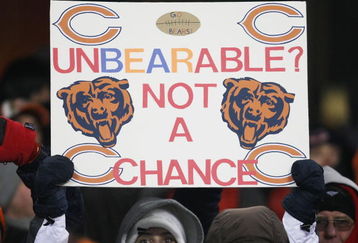 CHICAGO - DECEMBER 22: A fan of the Chicago Bears holds a sign during a game between the Bears and the Green Bay Packers on December 22, 2008 at Soldier Field in Chicago, Illinois. The Bears defeated the Packers 20-17 in overtime. (Photo by Jonathan Daniel/Getty Images)