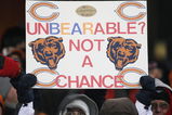 CHICAGO - DECEMBER 22: A fan of the Chicago Bears holds a sign during a game between the Bears and the Green Bay Packers on December 22, 2008 at Soldier Field in Chicago, Illinois. The Bears defeated the Packers 20-17 in overtime. (Photo by Jonathan Daniel/Getty Images)