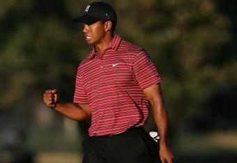 ORLANDO, FL - MARCH 29:  Tiger Woods celebrates a birdie putt on the 15th hole during the final round of the Arnold Palmer Invitational Presented by Mastercard at the Bay Hill Club and Lodge on March 29, 2009 in Orlando, Florida   (Photo by Doug Benc/Getty Images)