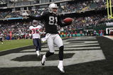 OAKLAND, CA - DECEMBER 21: Chaz Schilens #81 of the Oakland Raiders celebrates scoring a touchdown past Jacques Reeves #35 of the Houston Texans during an NFL game on December 21, 2008 at the Oakland-Alameda County Coliseum in Oakland, California.  (Photo by Jed Jacobsohn/Getty Images)