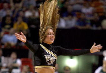 MIAMI - MARCH 20:  A Wake Forest Demon Deacons   Cheerleader dances on the court during the first round of the NCAA Division I Men's Basketball Tournament during a game with the Cleveland State University at the American Airlines Arena on March 20, 2009 in Miami, Florida.  (Photo by Marc Serota/Getty Images);  (Photo by Marc Serota/Getty Images)