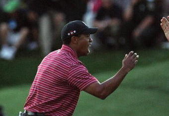 ORLANDO, FL - MARCH 29:  Tiger Woods of the USA holes for a winning birdie at the 18th hole during the final round of the Arnold Palmer Invitational Presented by Mastercard at the Bay Hill Club and Lodge on March 29, 2009 in Orlando, Florida  (Photo by David Cannon/Getty Images)