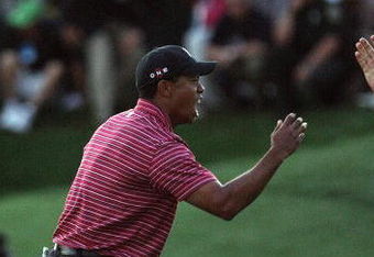 ORLANDO, FL - MARCH 29:  Tiger Woods of the USA holes for a winning birdie at the 18th hole during the final round of the Arnold Palmer Invitational Presented by Mastercard at the Bay Hill Club and Lodge on March 29, 2009 in Orlando, Florida  (Photo by David Cannon/Getty Images)