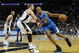 SAN ANTONIO - JANUARY 31: David West #30 of the New Orleans Hornets drives the ball past Matt Bonner #15 of the San Antonio Spurs on January 31, 2009 at AT&T Center in San Antonio, Texas. NOTE TO USER: User expressly acknowledges and agrees that, by downloading and/or using this Photograph, user is consenting to the terms and conditions of the Getty Images License Agreement. (Photo by Ronald Martinez/Getty Images)