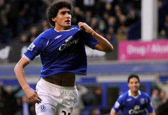 LIVERPOOL, UNITED KINGDOM - OCTOBER 25:  Marouane Fellaini of Everton celebrates after scoring during Barclays Premier League match between Everton and Manchester United at Goodison Park on October 25, 2008 in Liverpool, England.  (Photo by Shaun Botterill/Getty Images)