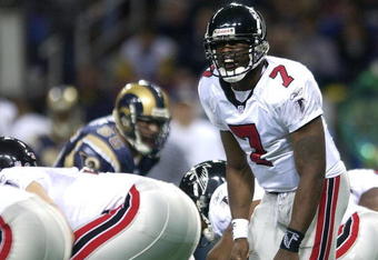 6 Jan 2002: Michael Vick #7 of the Atlanta Falcons calls out the play against the St. Louis Rams at the Dome at America's Center in St. Louis, Missouri. The St. Louis Rams beat the Atlanta Falcons 31-13.  DIGITAL IMAGE. Mandatory Credit: Elsa /Getty Images