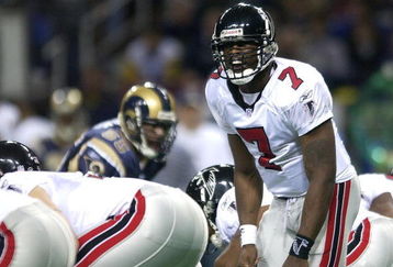 6 Jan 2002: Michael Vick #7 of the Atlanta Falcons calls out the play against the St. Louis Rams at the Dome at America's Center in St. Louis, Missouri. The St. Louis Rams beat the Atlanta Falcons 31-13.  DIGITAL IMAGE. Mandatory Credit: Elsa /Getty Images