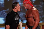 UNIVERSAL CITY, CA - AUGUST 14:  Wrestlers John Cena and Hulk Hogan present an award onstage at the 2005 Teen Choice Awards held at Gibson Amphitheatre at Universal CityWalk on August 14, 2005 in Universal City, California.  (Photo by Kevin Winter/Getty Images)