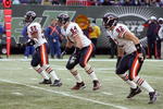 EAST RUTHERFORD, NJ - NOVEMBER 19:  Lance Briggs #55, Brian Urlacher #54, Hunter Hillenmeyer #92 of the Chicago Bears gets moves off the line during the game against the New York Jets on November 19, 2006 at Giants Stadium in East Rutherford, New Jersey.The Bears defeated the Jets 10-0.  (Photo by Jim McIsaac/Getty Images)