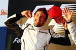 MELBOURNE, AUSTRALIA - MARCH 29:  Jenson Button of Great Britain and Brawn GP celebrates on the podium after winning the Australian Formula One Grand Prix at the Albert Park Circuit on March 29, 2009 in Melbourne, Australia.  (Photo by Clive Mason/Getty Images)