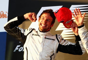 MELBOURNE, AUSTRALIA - MARCH 29:  Jenson Button of Great Britain and Brawn GP celebrates on the podium after winning the Australian Formula One Grand Prix at the Albert Park Circuit on March 29, 2009 in Melbourne, Australia.  (Photo by Clive Mason/Getty Images)