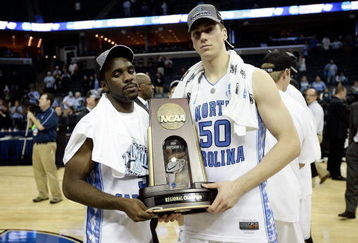 MEMPHIS, TN - MARCH 29:  (L-R) Ty Lawson #5 and Tyler Hansbrough #50 of the North Carolina Tar Heels pose with the South Regional trophy after defeating the Oklahoma Sooners during the NCAA Men's Basketball Tournament South Regional Final at the FedExForum on March 29, 2009 in Memphis, Tennessee. The Tar Heels defeated the Sooners 72-60 to advance to the Final Four.  (Photo by Joe Murphy/Getty Images)
