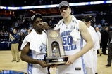 MEMPHIS, TN - MARCH 29:  (L-R) Ty Lawson #5 and Tyler Hansbrough #50 of the North Carolina Tar Heels pose with the South Regional trophy after defeating the Oklahoma Sooners during the NCAA Men's Basketball Tournament South Regional Final at the FedExForum on March 29, 2009 in Memphis, Tennessee. The Tar Heels defeated the Sooners 72-60 to advance to the Final Four.  (Photo by Joe Murphy/Getty Images)