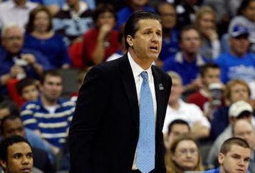 KANSAS CITY, MO - MARCH 21:  Head Coach John Calipari of the Memphis Tigers looks on from the sideline during their second round game against the Maryland Terrapins in the NCAA Division I Men's Basketball Tournament at the Sprint Center on March 21, 2009 in Kansas City, Missouri. The Tigers defeated the Terrapins 89-70.  (Photo by Jamie Squire/Getty Images)